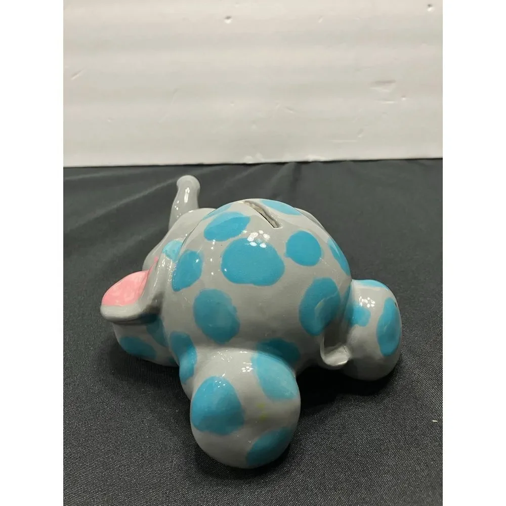 Vintage Elephant piggy bank. Gray with blue dots‎
